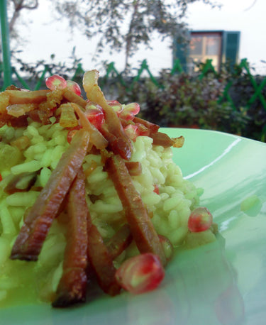 foto ricetta Riso con speck e melagrana 