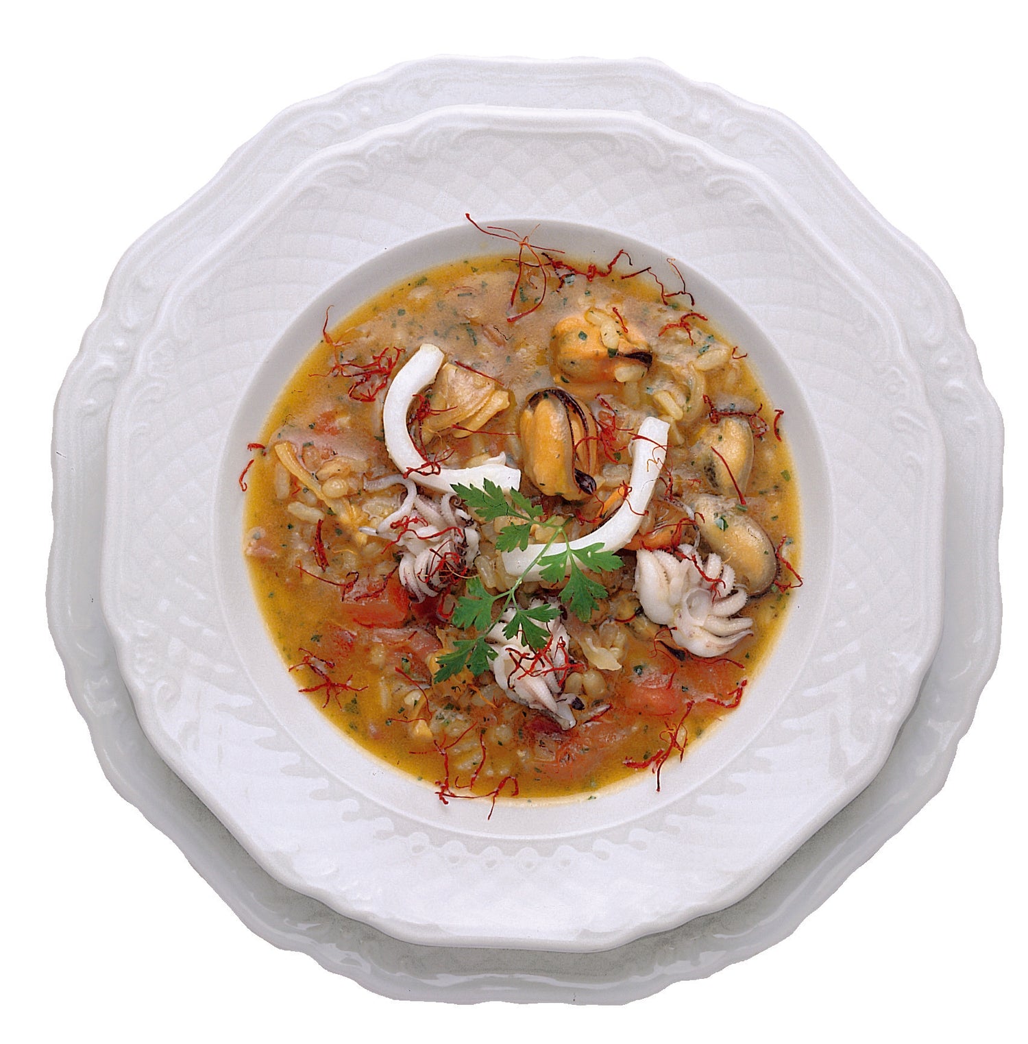foto ricetta Minestra di riso con pancetta, cozze e seppie allo zafferano 