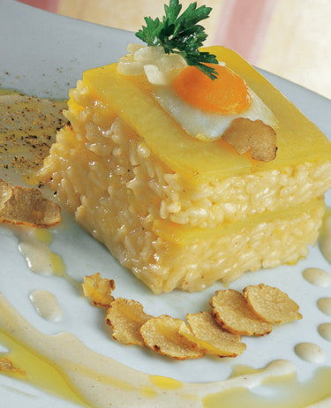 foto ricetta Torta di riso, patate e uovo di quaglia con crema di riso alla noce moscata e tartufo bianco 