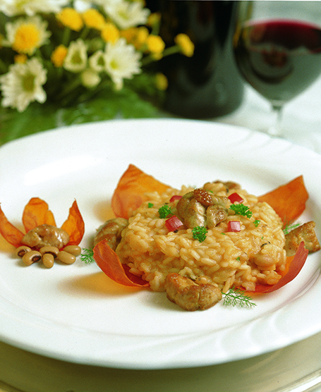 RICE WITH BLACK-EYED BEANS SERVED WITH SWEETBREADS ON TOMATO PETALS