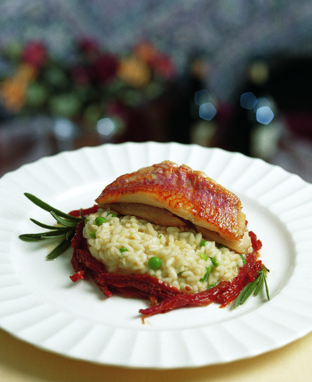 GRILLED RED MULLET WITH PEA RISOTTO AND DRIED TOMATOES